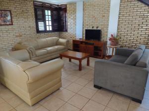 Χώρος καθιστικού στο Linda casa próximo do Beach Park