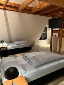 Postel nebo postele na pokoji v ubytování Ferien- Monteurwohnung