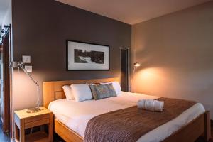 Ένα ή περισσότερα κρεβάτια σε δωμάτιο στο Lakefront Mountain View - Resort Access Loft +45 φωτογραφίες