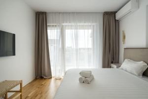 Giường trong phòng chung tại The WHITE - Family Escape - Loft +25 ảnh