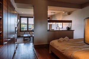 Postel nebo postele na pokoji v ubytování Lakefront Mountain View - Resort Loft