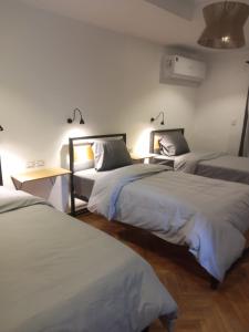 Postel nebo postele na pokoji v ubytování Pyramids Nights Hostel
