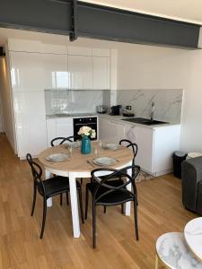 Cucina o angolo cottura di Appartement neuf, vue sur saône