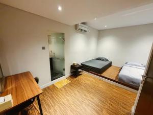 Кровать или кровати в номере Adenia Padma 3 Bedroom House