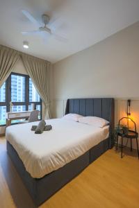 Ένα ή περισσότερα κρεβάτια σε δωμάτιο στο Maya Bay Residence Banting Icon Stay