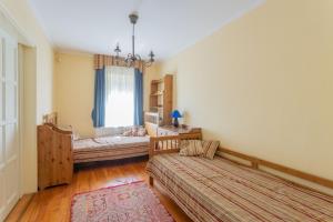 En eller flere senge i et værelse på Sellő Beach Villa + 78 billeder