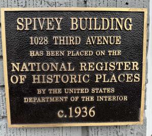 a sign on the side of a building at Modern Retreat in the Heart of Conway in Conway +1 photo