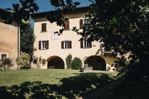 an external view of the house from the garden at La Corte di San Rocco in Trento