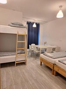 Postel nebo postele na pokoji v ubytování Augarten R19