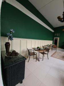 Un lugar para sentarse en Hotel Class Colonial