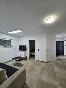 Μια τηλεόραση ή/και κέντρο ψυχαγωγίας στο Apartman rudolf