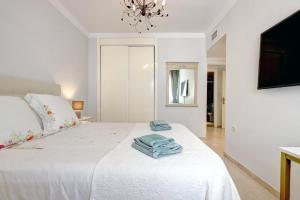 Banana Beach primera línea de playa客房内的一张或多张床位