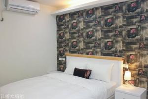 מיטה או מיטות בחדר ב-Peacock hotel