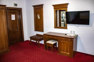 TV a/nebo společenská místnost v ubytování Hotel Rebis