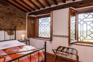 Postel nebo postele na pokoji v ubytování Casa Aurora