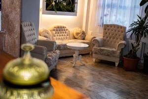 Posezení v ubytování Hotel Rebis