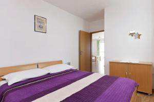 Posteľ alebo postele v izbe v ubytovaní Apartment Ljilja