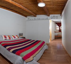 Postel nebo postele na pokoji v ubytování Puna Hostel + 54 fotografií
