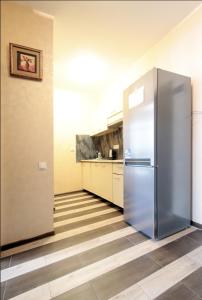 Η κουζίνα ή μικρή κουζίνα στο "Deluxe Apartments" C 16-Є - 1221 +2 φωτογραφίες
