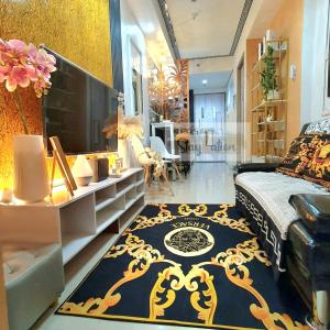 a bedroom with a bed and a room with a mirror at Condo in Pasay S Residences in Manila +36 photos