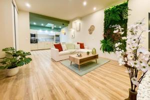 Χώρος καθιστικού στο L'atelier vert - Suite Luxe, SPA, Proche Hypercentre - Classé 4 étoiles