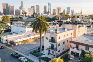 an aerial view of a city with a palm tree at Luxe Townhouse Near Downtown La in Los Angeles