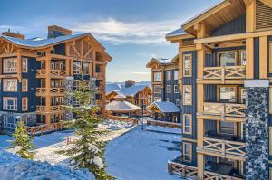 an image of a lodge in the snow at Stonegate Resort Unit A202 in Big White