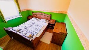 Postel nebo postele na pokoji v ubytování Zalán apartmann + 12 fotografií