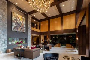 a lobby of a hotel with a chandelier at The Swiftwater in Swiftwater