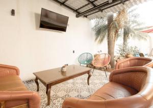 Χώρος καθιστικού στο Casa Zula, un espacio encantador en Tlaquepaque