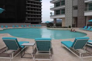 Bazén v ubytování Sui Loft santa marta nebo v jeho okolí