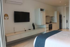 Kuchyň nebo kuchyňský kout v ubytování Sui Loft santa marta