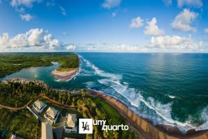 an aerial view of the ocean from a resort at Ponta de Inhambupe Residences in Baixio