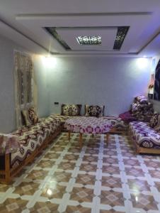 a living room with couches in a room at waltit apartement in Agadir