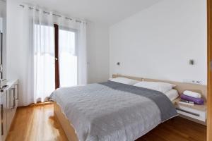 Postel nebo postele na pokoji v ubytování Apartment Marija