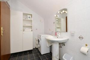Kúpeľňa v ubytovaní Apartment Bozo
