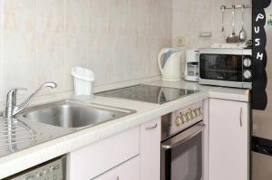 Kuchyňa alebo kuchynka v ubytovaní Apartment Bozo