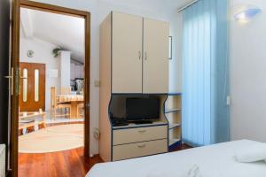Posteľ alebo postele v izbe v ubytovaní Apartment Bozo