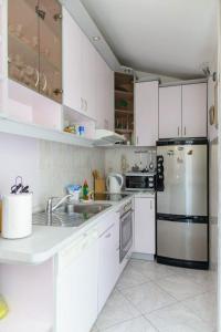 Kuchyňa alebo kuchynka v ubytovaní Apartment Bozo