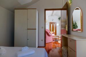 Posteľ alebo postele v izbe v ubytovaní Apartment Bozo