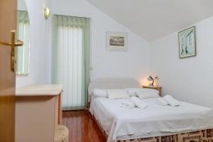 Posteľ alebo postele v izbe v ubytovaní Apartment Bozo