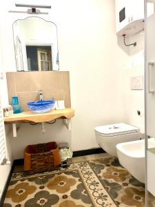 a bathroom with a sink and a toilet at B&B an ciazza in Calizzano +17 photos
