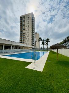 Πισίνα στο ή κοντά στο Bahía Azul Suites, Piscina & Pádel