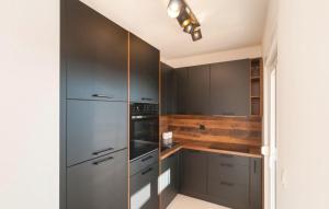 Kuchyň nebo kuchyňský kout v ubytování Apartment Tom