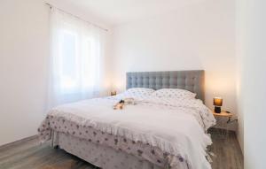 Postel nebo postele na pokoji v ubytování Apartment Tom