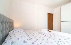 Postel nebo postele na pokoji v ubytování Apartment Tom