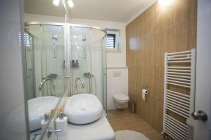 Kúpeľňa v ubytovaní Apartments Palmina