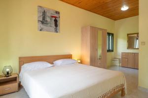 Postel nebo postele na pokoji v ubytování House Momento
