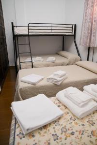 Postel nebo postele na pokoji v ubytování Casa Rural LA ENCINA