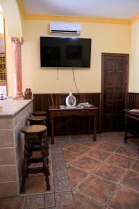 TV a/nebo společenská místnost v ubytování Casa Rural LA ENCINA